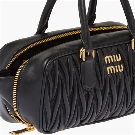 miu miu matelasse bag clutch|Black Matelassé Nappa Leather Clutch .